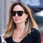 Angelina Jolie Wore A Winter Coat In Mid August