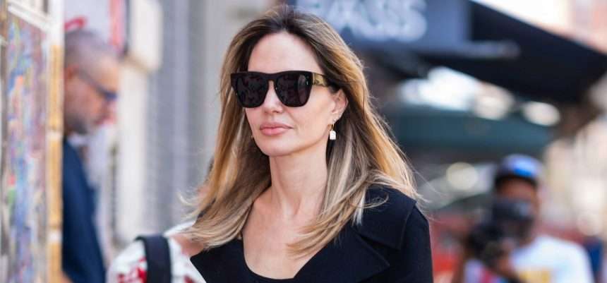 Angelina Jolie Wore A Winter Coat In Mid August