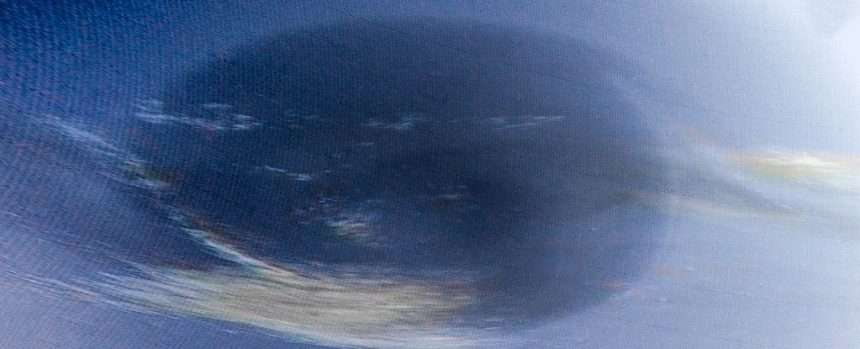 Neptune's Mysterious Dark Vortex Observed From Earth For The First