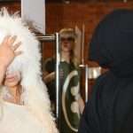 Kanye West's 'wife' Wears Giant White Wig, Swimsuit And Trademark