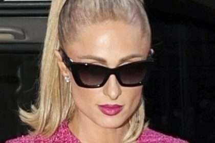 Paris Hilton Shows Off Her Legs In Pink Minidress As