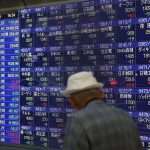 Asian Markets Fall, Japan's Business Confidence Improves