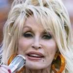 Dolly Parton, 77, Flaunts Her Famous Cleavage In A Dazzling