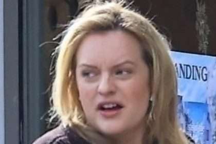 Elisabeth Moss Looks Casual In A Dark Brown Sweater And