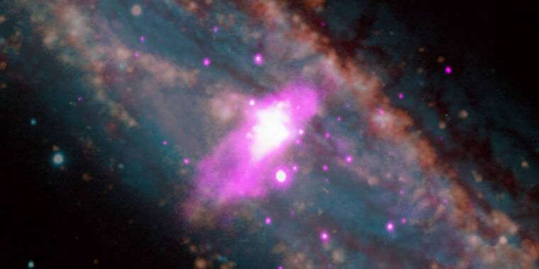 Galaxy Scale Wind Discovered In Distant Space