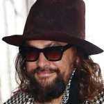 Jason Momoa Wears A Houndstooth Jacket And Carries A Louis