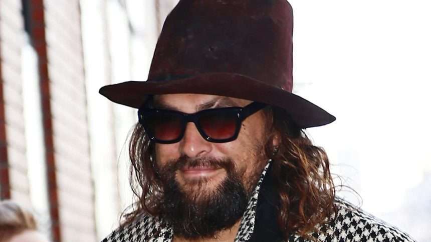 Jason Momoa Wears A Houndstooth Jacket And Carries A Louis