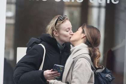 Sophie Turner Enjoys A Smoke And Smooch With Friends After