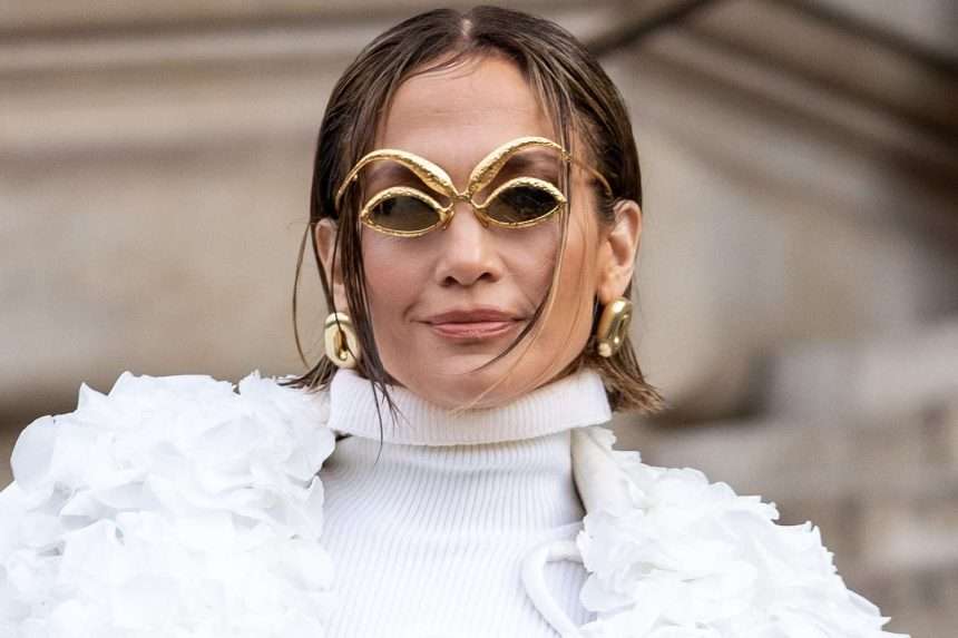 Jennifer Lopez Wears Schiapellelli Rose Petal Jacket At Paris Fashion