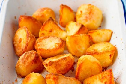 This Recipe For Giant, Crispy, Meaty Roast Potatoes Is Perfect