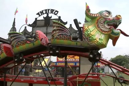 A Kiddie Coaster Carrying Children Derails During A Carnival In